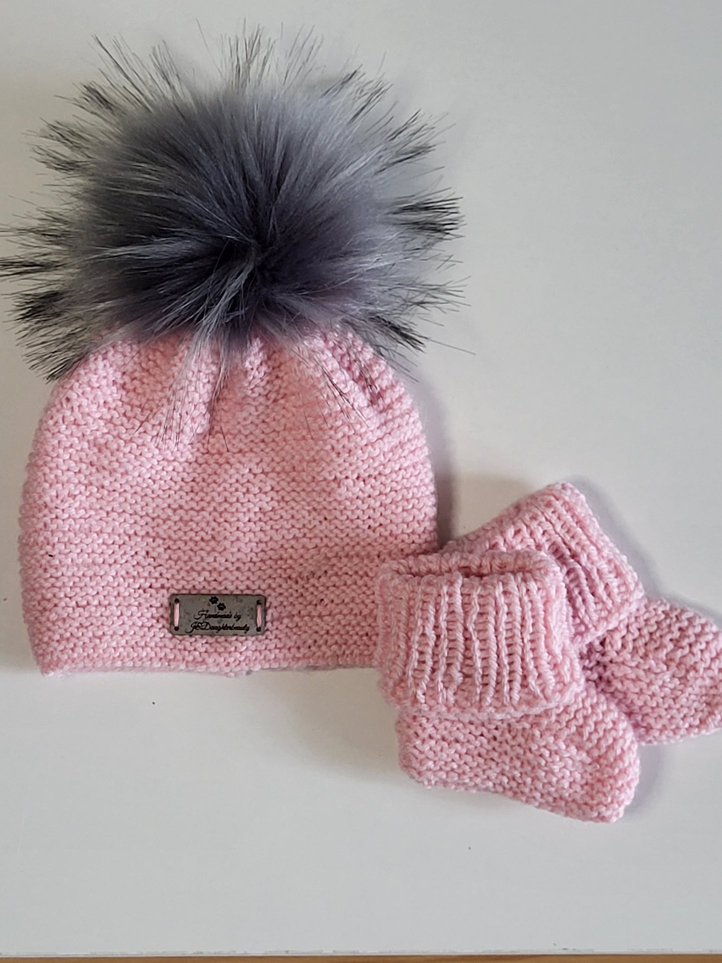 Knitted baby beanie hats and baby boots set