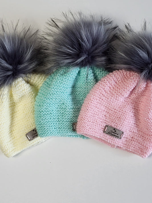 Knitted baby beanie hats and baby boots set