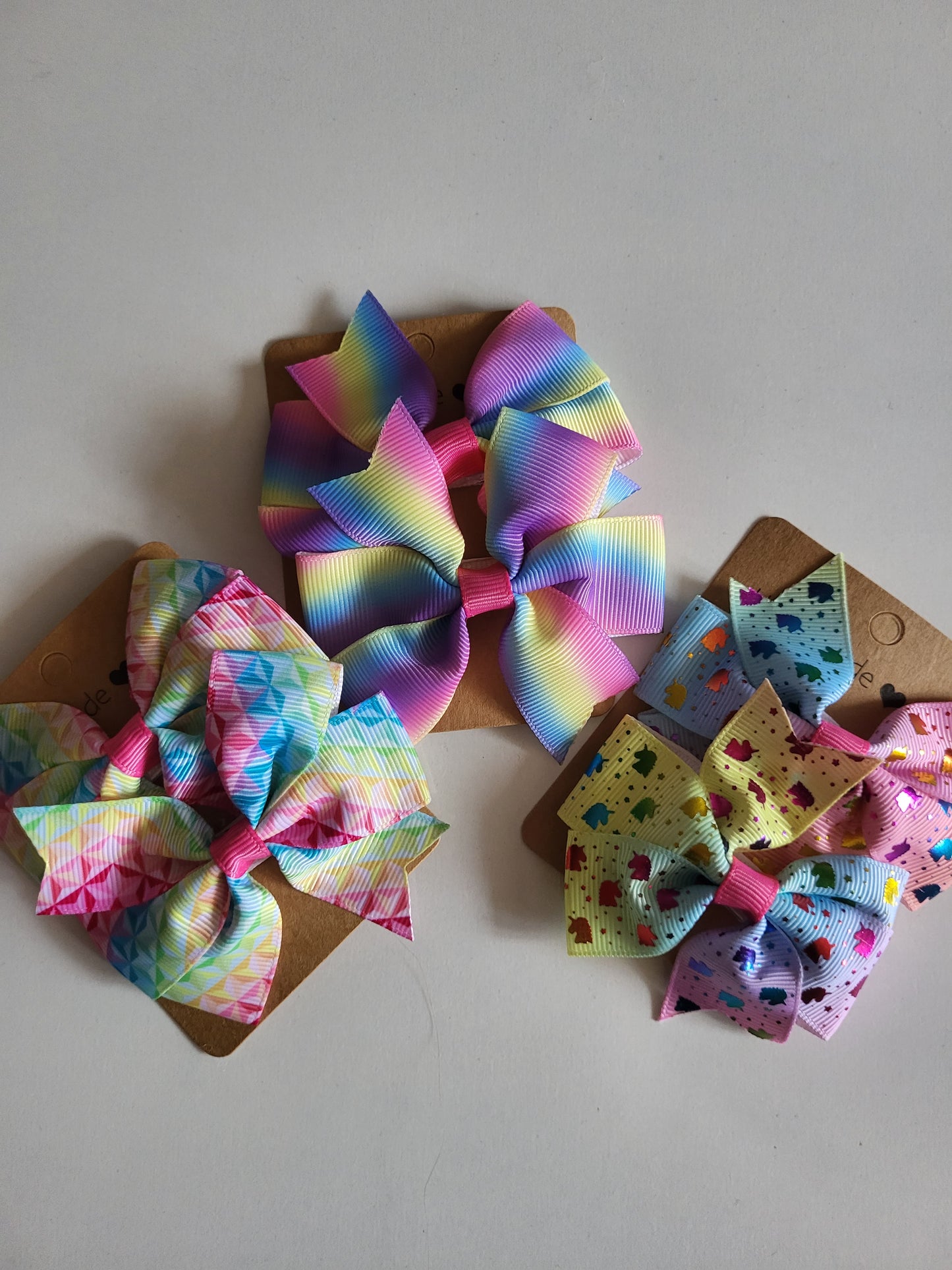 Colourful bow hair clips ×2